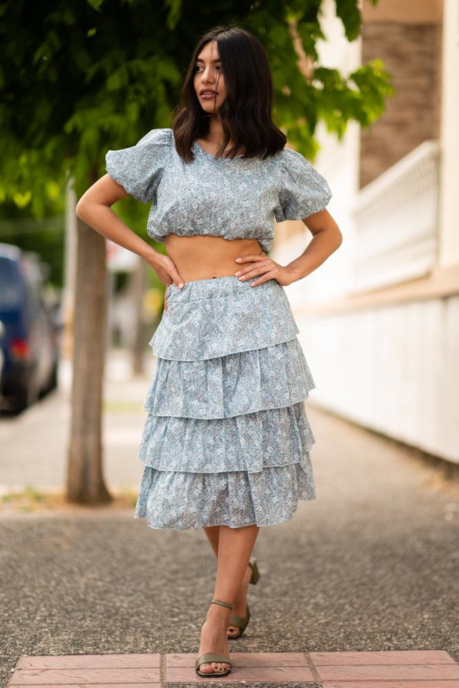 Brunette woman wearing set Crop Top - Skirt Ruffle in light blue color