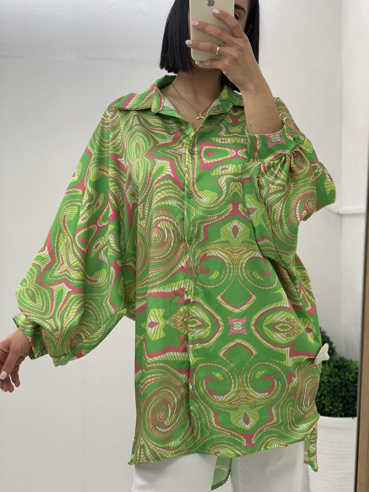 Satin shirts printed in green shades