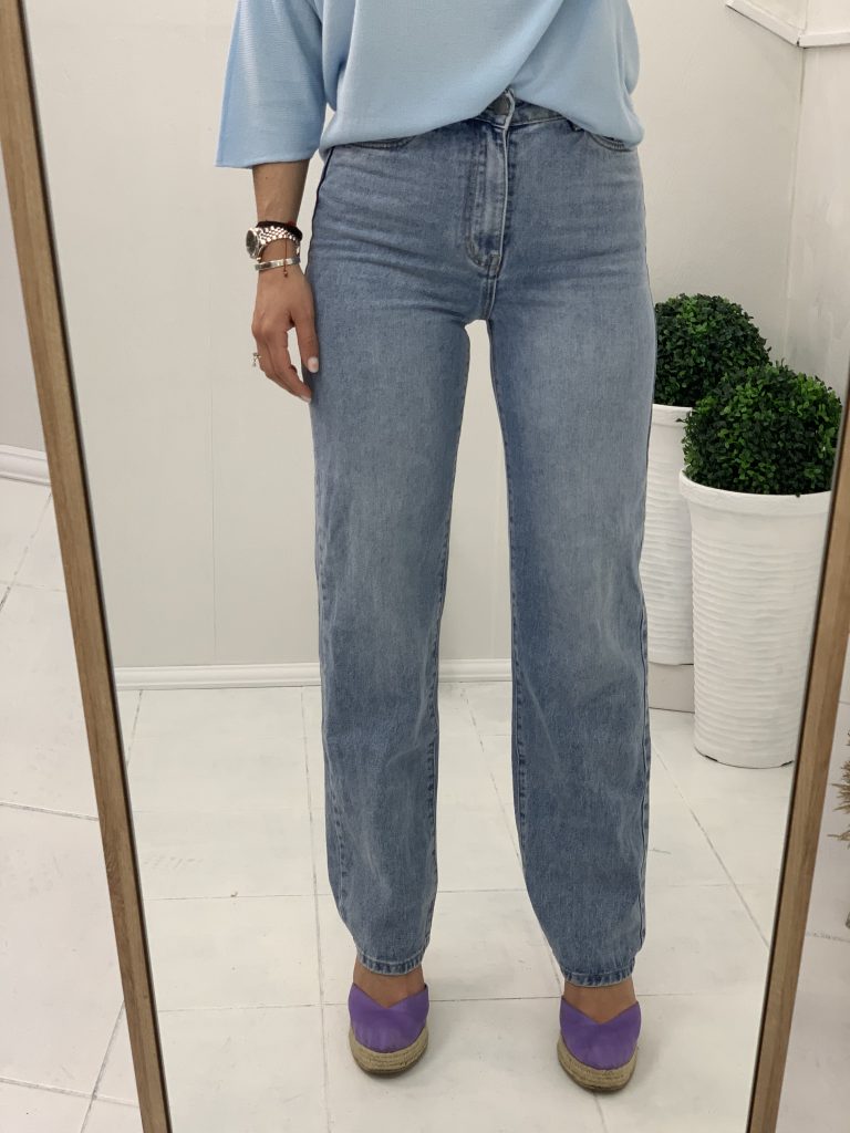 High-waisted light-colored jeans